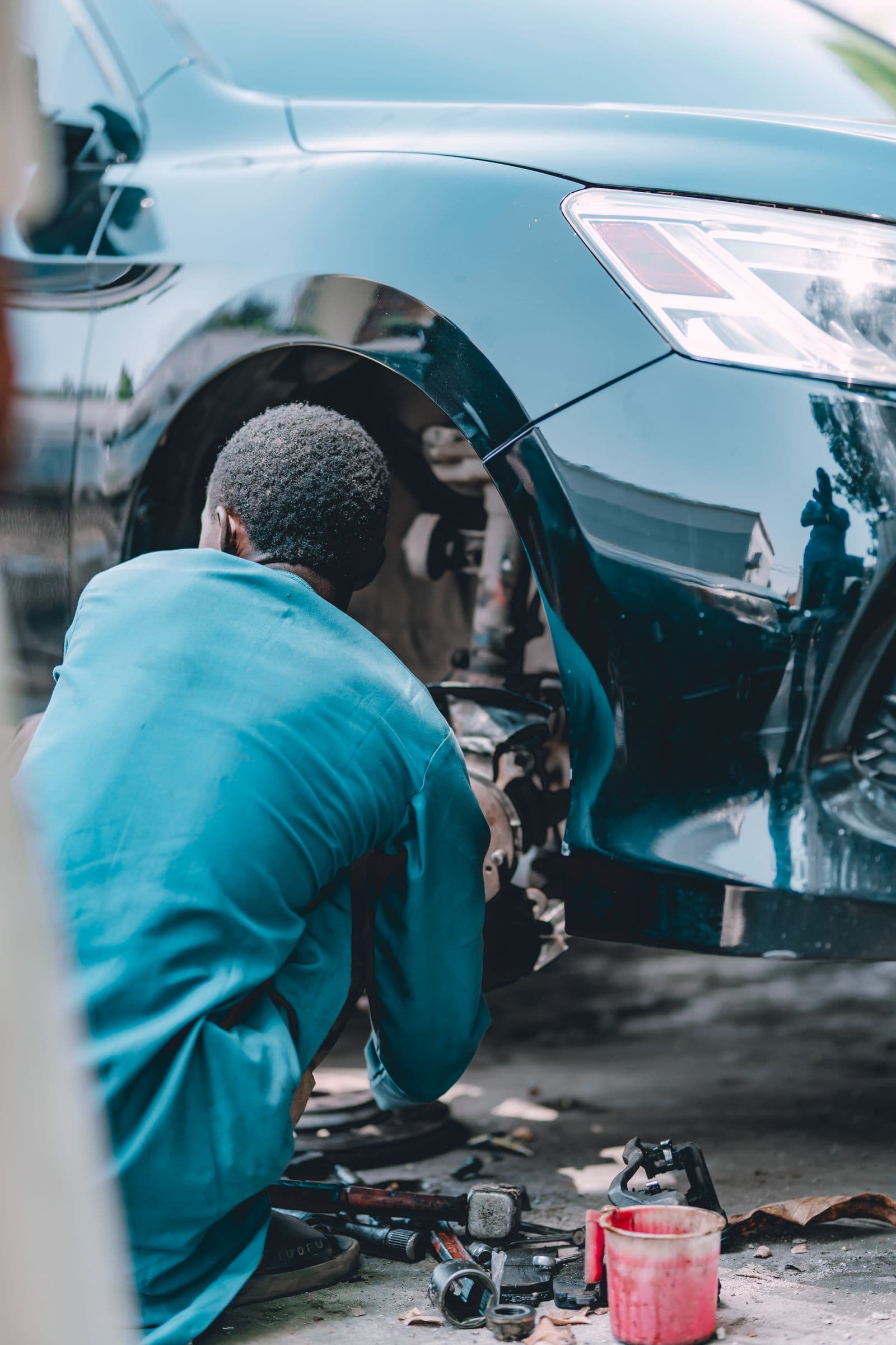 Mechanic working on a brake and wheel job
